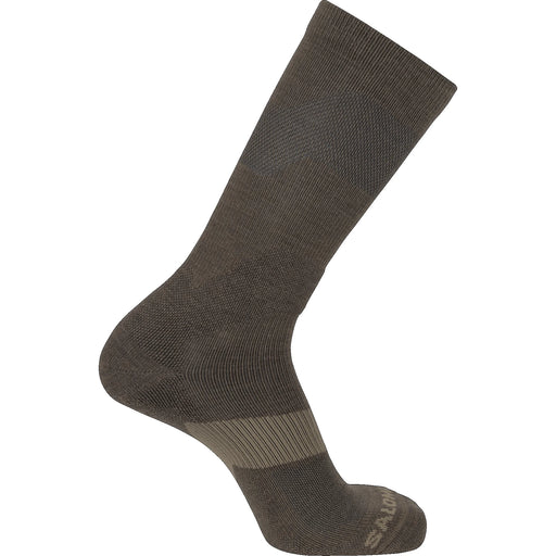 A side profile view of the XA Forces Crew Socks in Coyote Brown, highlighting the reinforced heel and toe areas for durability, along with the breathable mesh panels for moisture management.